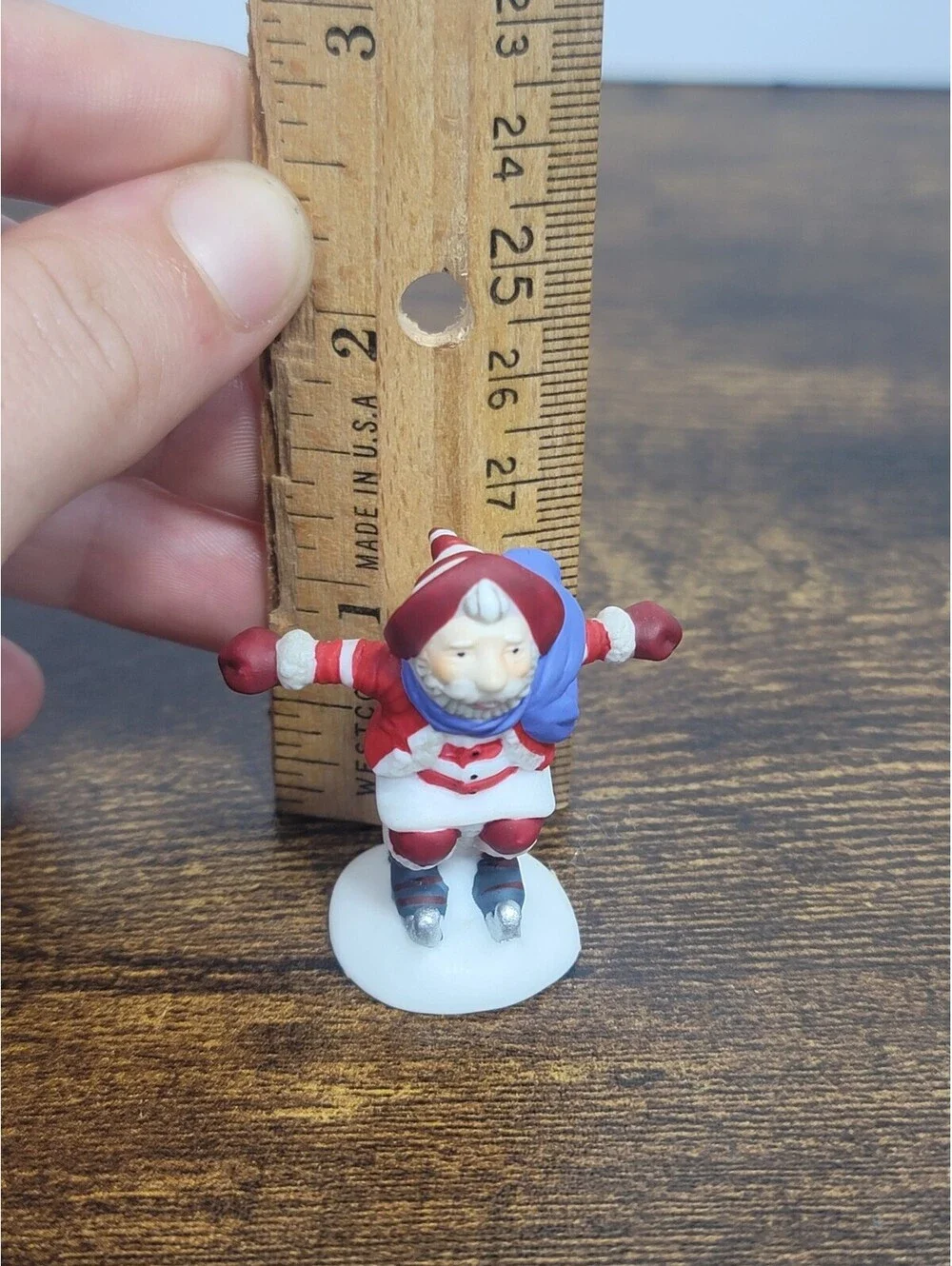 Department 56 Santa Figurine with Blue Scarf on Skates